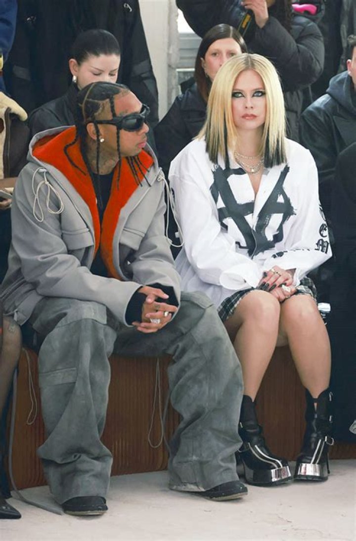Avril Lavigne & Tyga Confirm Romance With Kiss At Paris Fashion Week – Hollywood Life