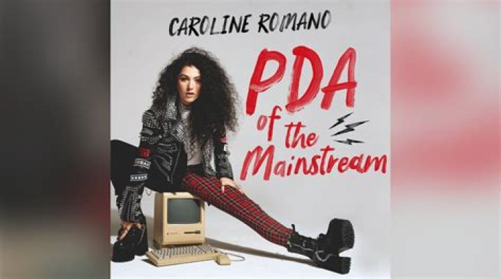 Caroline Romano Smashes The Toxicity Of Social Media ‘With A Hammer’ In ‘PDA Of The Mainstream’