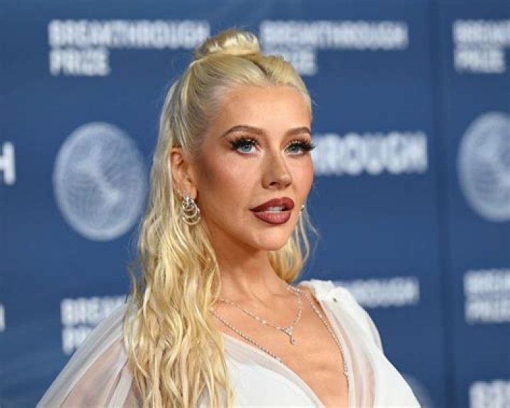 Christina Aguilera, 40, Rocks Sexy Red Bikini In The Pool For Christmas