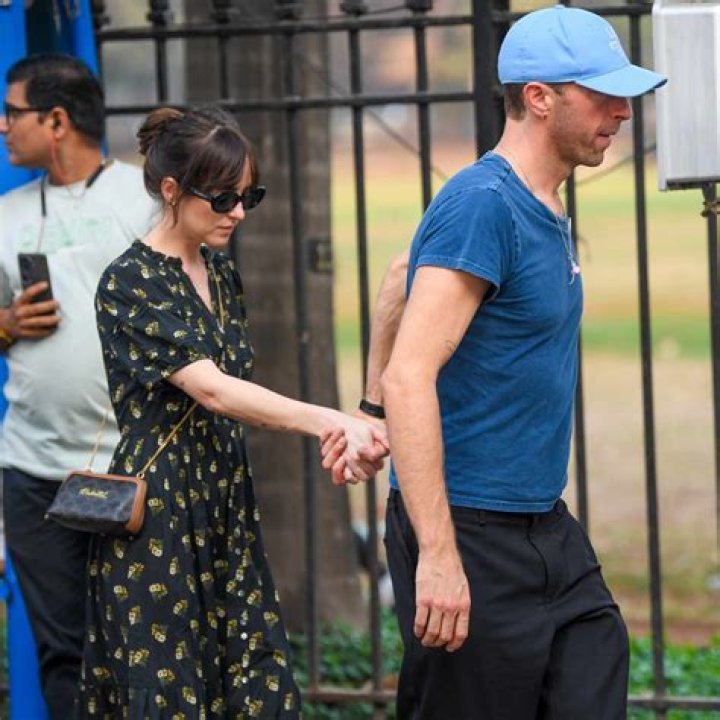 Dakota Johnson & Chris Martin Are Spotted In Rare Outing Driving Around Malibu In Her Mustang — See Pics