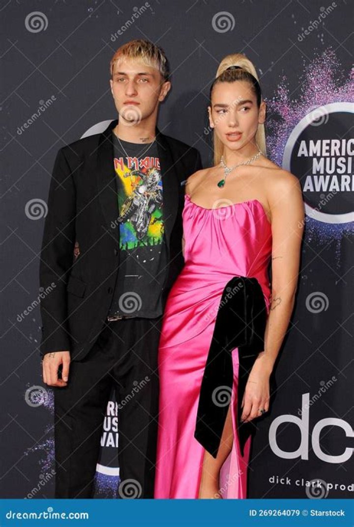 Dua Lipa & Anwar Hadid Make Out At The Dinner Table On Date Night — See Romantic Pics