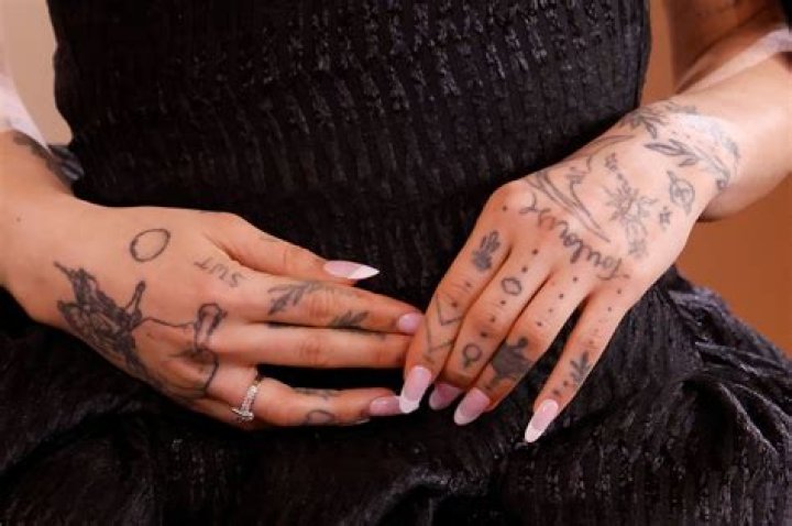 Emily Ratajkowski Celebrates 28th Birthday By Getting A Fake Tattoo Of Her Own Name Above Her Booty