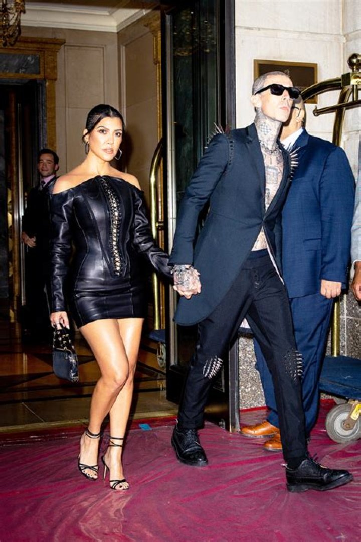 Kourtney Kardashian & Travis Barker Attend Christmas Eve Party 2021 – Hollywood Life
