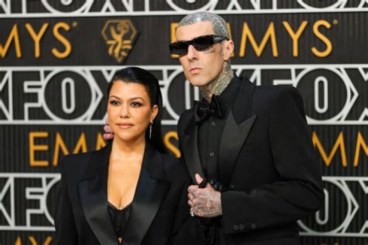 Kourtney Kardashian & Travis Barker Channel Creepy Vampires As They Cuddle For New Selfie