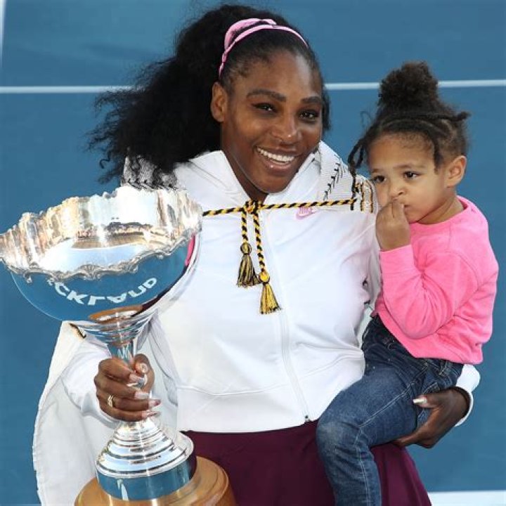 Serena Williams’ Daughter Olympia, 3, Wears Pompoms In Her Hair & Snuggles Her Favorite Doll: Cute Pic